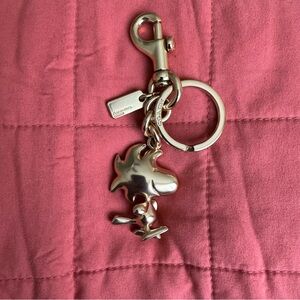 Coach x Peanuts Woodstock Keychain